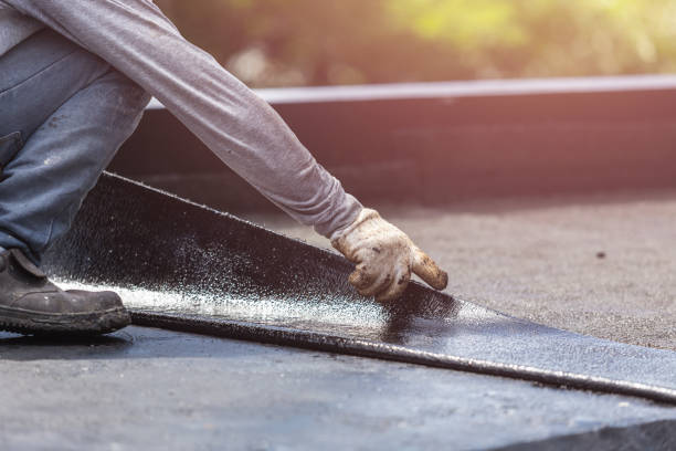 Professional Waterproofing technician working in Woodville, OH